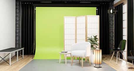 Armchair sofa in Studio room with blank green Screen.