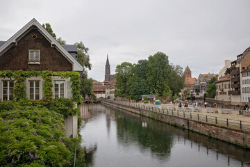 Beautiful family with children, boys, visiting Strasbourg during summer vacation