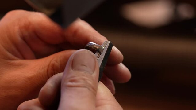 goldsmith jewelry ring making process ajdusting and polish gold ring