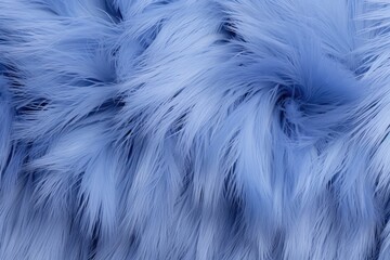 Blue-azure fur texture background close-up. Abstract animal navy fur or faux fur background.