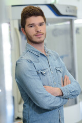 handsome young man smiling indoors