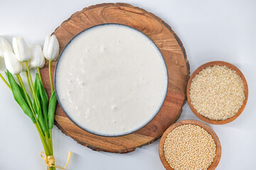 Selective focused image of fermented batter for idli and dosa in an isolated background. Idly and dosa batter in a bowl for fermentation, used to prepare the dosa and idli..