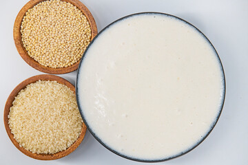 Selective focused image of fermented batter for idli and dosa in an isolated background. Idly and dosa batter in a bowl for fermentation, used to prepare the dosa and idli..