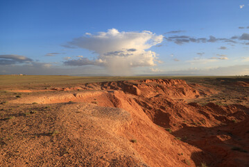 The rock formations of Bayanzag flaming cliff at sunset, Mongolia