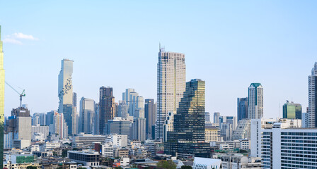 Fototapeta na wymiar Aerial view of Bangkok city in Thailand. Cityscape of modern buildings and urban architecture.