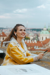 smiling traveller woman in blouse in Prague Czech Republic