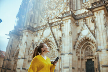 happy woman in Prague Czech Republic sightseeing and walking