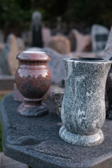 granite vases on polished granite table