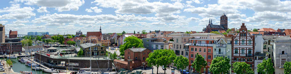 panoramic view of the city of Stralsund seen from the old harbour, Germany - obrazy, fototapety, plakaty
