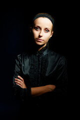 Close-up studio Portrait of Beautiful caucasian woman against dark background