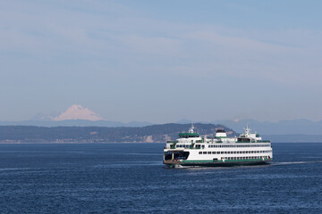 Passenger Ship Sailing Through Washington Sky over Water