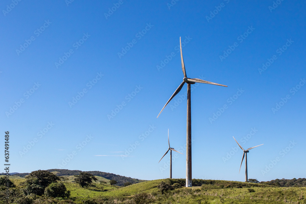 Wall mural Renewable Energy: Wind Turbines Harnessing Nature's Power