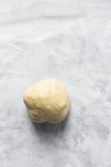 Top view of sugar cookie dough, process of making cut out sugar cookies