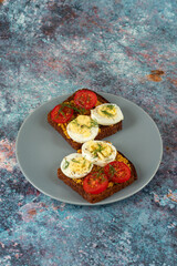 Serving diet sandwiches on a plate. Sandwiches with eggs and French mustard.