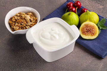 Traditional homemade Greek yoghurt with granola