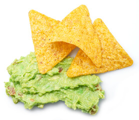 Guacamole sauce and tortilla chips, popular Mexican food  top view on white background.