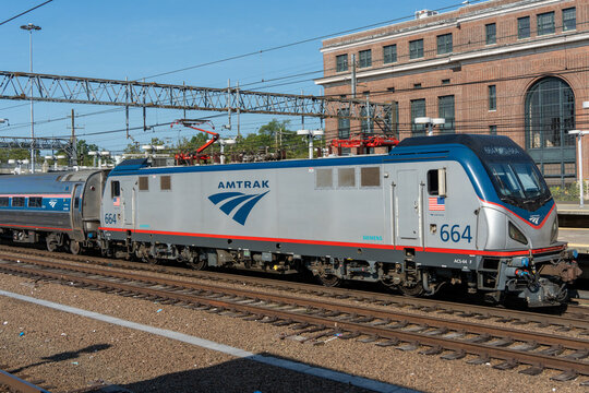 New Haven, CT, USA - August 12th, 2023 - An Amtrak train makes it's way into Union Station on a warm summer morning. High quality photo