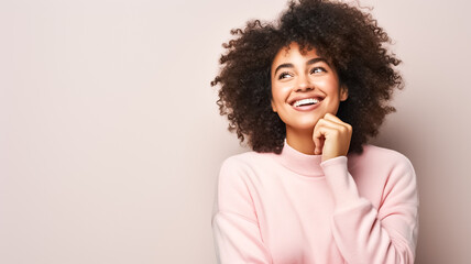 Fototapeta na wymiar Portrait of cheerful curly haired beautiful african american woman smile toothily being in good mood. Smiling beautiful afro girl. Curly black hair. Emotion concept.