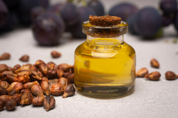 Grapeseed oil in a glass jar close-up.