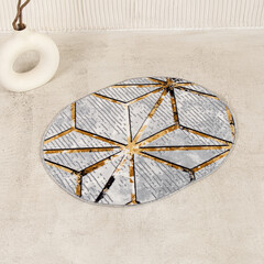 Gray bath mat with ornaments. Oval carpet
