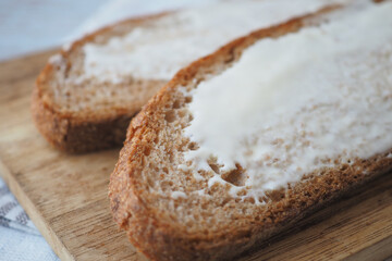 cheese cream spread on fresh bread 