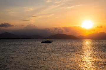 Fototapeta na wymiar Sunset at Aegean sea at Evia island in Greece