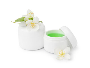 Fototapeta na wymiar Jars of cosmetic products with beautiful jasmine flowers on white background