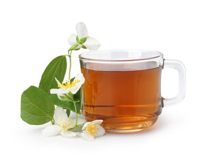 Glass cup of aromatic tea and beautiful jasmine flowers on white background