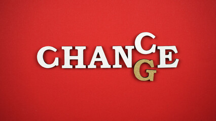 White letters create words - change and chance - on a red backround. Change to chance concept. Changes and new chances in a person's life. Top view