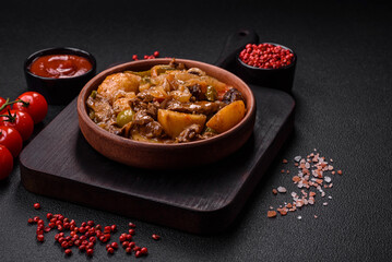 Delicious fresh stew of potatoes, tomatoes, onions, carrots and beef