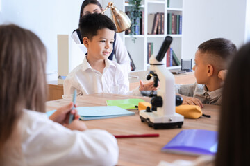 Obraz premium Little school children in classroom during lesson