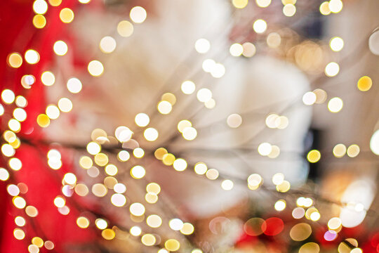 festive red background with blurry yellow lights