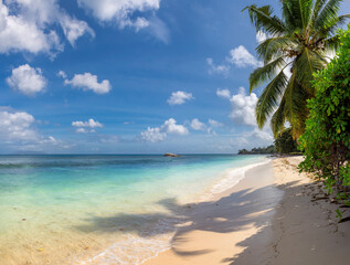 Beautiful beach, tropical turquoise sea, palms and blue sky. Summer vacation and tropical beach concept.
