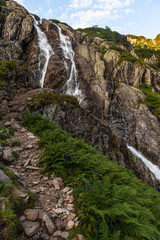 Alpine waterfall " Wielka Siklawa" in Tatra Mountains in Poland, at summer