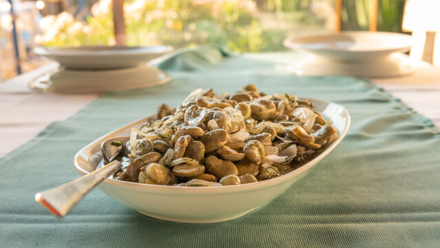 Traditional Turkish food; Fresh broad bean salad with olive oil, broad beans, onion and dill (Turkish name; i&ccedil; bakla) Mediterranean style fava beans.
