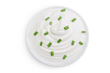 sour cream or yogurt in ceramic bowl isolated on white background with full depth of field. Top view. Flat lay