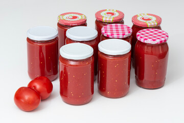 Homemade tomato sauce in the jars traditional prep for the winter months.