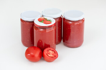 Homemade tomato sauce in the jars traditional prep for the winter months.
