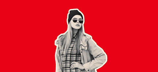 Fashion portrait of blonde young woman in black sunglasses and hat on red background, magazine style