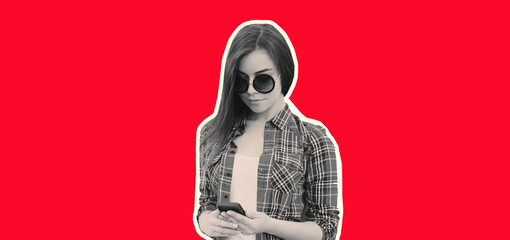 Portrait of young woman with mobile phone on red background