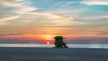 Lifeguard tower at Sunrise in Miami Beach, Florida. Vintage processed. Fashion travel and tropical...