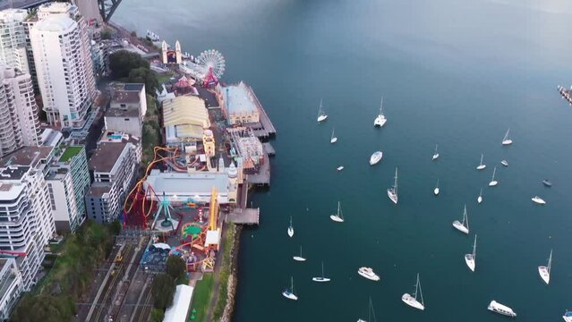 Surface of Lavender bay to city of Sydney cityscape in aerial sunrise 4k.
