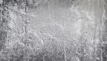 The real silver texture in grunge style. The urbanistic wall with painting spots and monochrome...