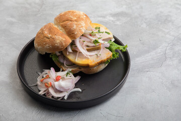 Butifarra traditional peruvian sandwich made of artisanal pork ham