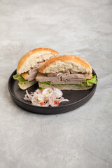 Butifarra traditional peruvian sandwich made of artisanal pork ham