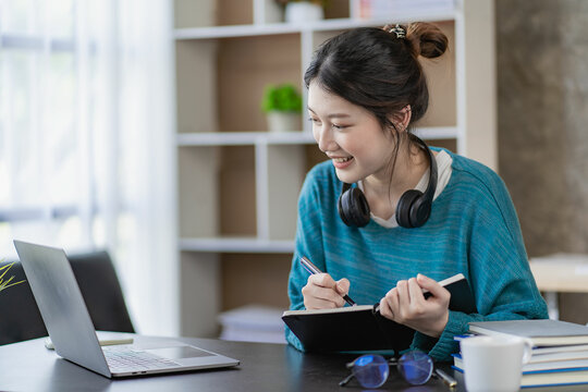 Beautiful Asian Student Studying Online Zoom Online Video Call Class With Happy Female Teachers Learn English Online With Your Laptop Computer At Home.