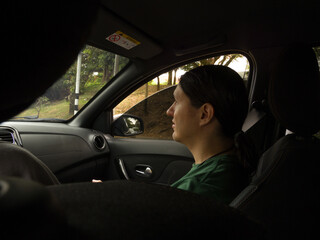 Man in Car Front Seat with Worried Expression