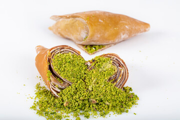 Turkish pestil amulet with pistachio. (Gaziantep Muska - Fistik Muskasi). Traditional amulet fruit...