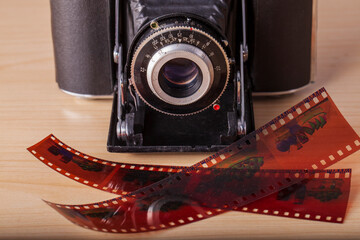 Antique film folding camera and old film