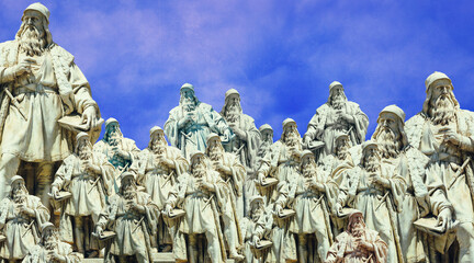 Collage of Leonardo da Vinci monuments against a blue sky